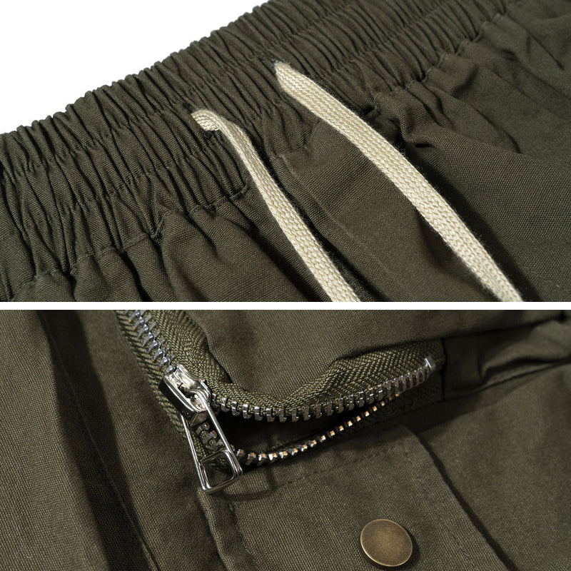 Short décontracté multi-poches tridimensionnel de style militaire pour homme, couleur unie